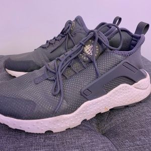 Grey and white Nike air huaraches